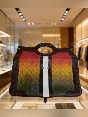 L.A.M.B. Carlisle Rasta Ombré clutch